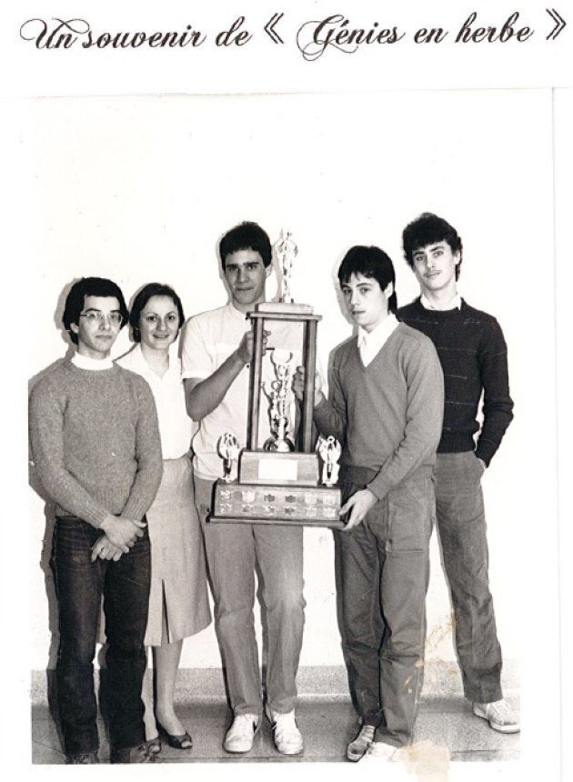 Guy Caron holds a trophy from a Génies En Herbe competition in 1985.