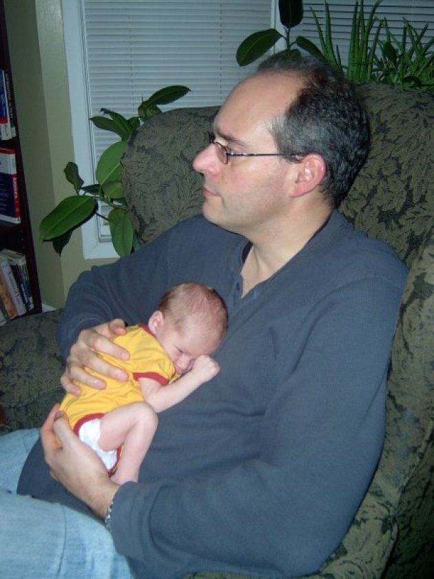 Guy Caron with his first-born, son Dominic, one day after he was born in Jan. 2009.