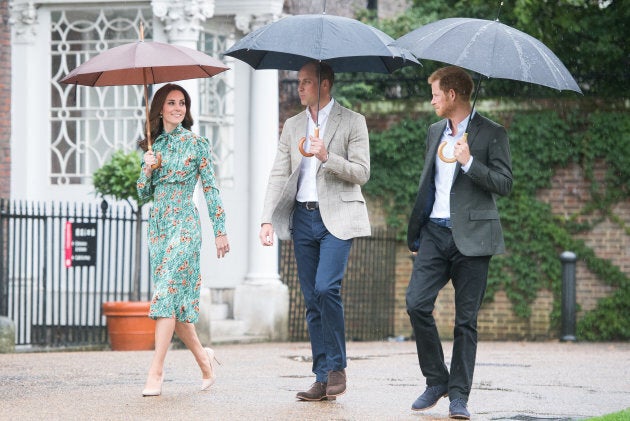 Prince William, Duke of Cambridge, Catherine, Duchess of Cambridge and Prince Harry visit The Sunken Garden at Kensington Palace on August 30, 2017 in London, England.