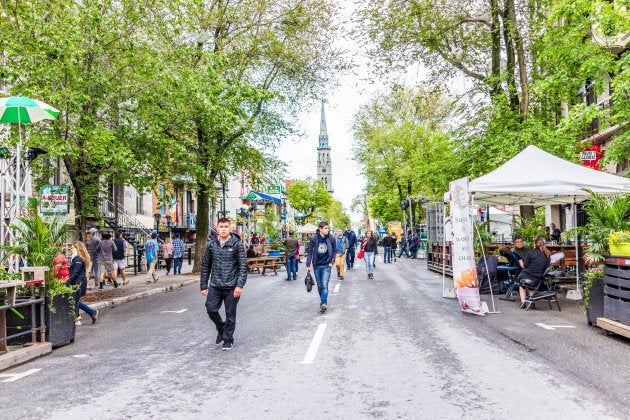 People walk on Saint Denis Street in Montreal's Plateau Mont Royal neighbourhood.