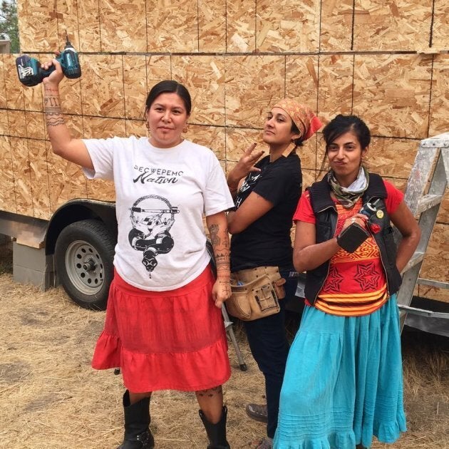 Kanahus Manuel, left, came up with the idea of building tiny homes after attending the Standing Rock protest.