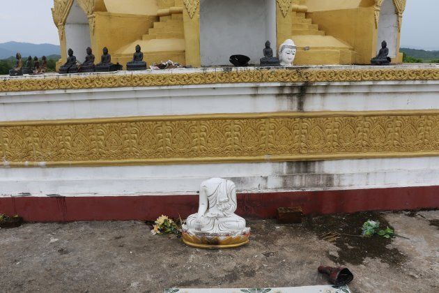 A decapitated Buddhist statue, allegedly committed by a militant group as communal violence between Buddhists and Muslims spike in the region, is seen in the southern Maungdaw area of Myanmar's Rakhine state on Sept. 4, 2017.
