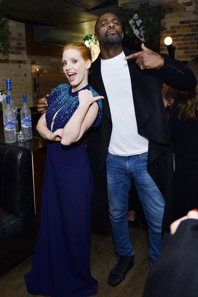 Jessica Chastain and Idris Elba pose together at the MOLLY'S GAME premiere party hosted by Grey Goose. (Photo by Stefanie Keenan/Getty Images for Grey Goose)