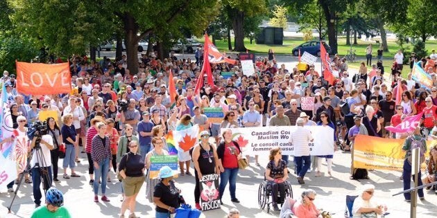 Hundreds of demonstrators rallied in Winnipeg on Saturday in opposition to a protest against immigration — that was subsequently cancelled.