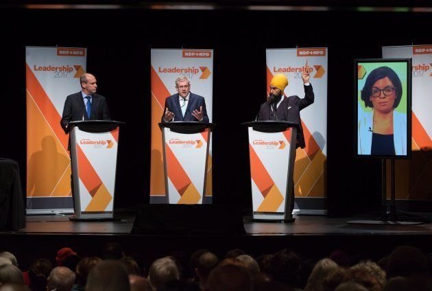 From left to right: Guy Caron, Charlie Angus, Jagmeet Singh and Niki Ashton (via satellite from Ottawa) participate in a federal NDP leadership debate in Vancouver on Sunday.