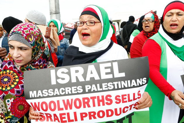 Pro-Palestinian Protestors supporting the Boycott Divestment and Sanctions (BDS) campaign against Israel, demonstrates ahead of Pharrell Williams concert outside Grand West Arena on Sept. 21, 2015 in Cape Town, South Africa.