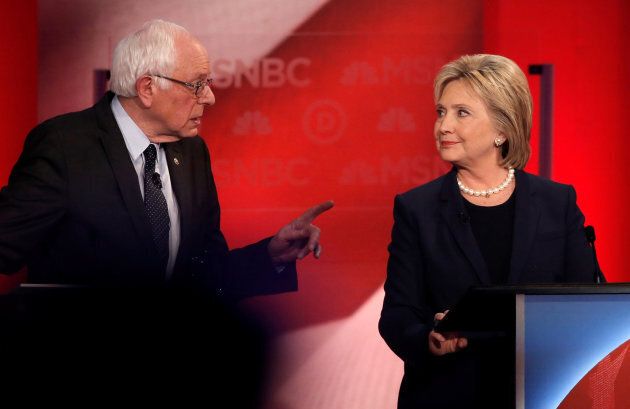 Sen. Bernie Sanders speaks to Hillary Clinton during a Democratic presidential candidates debate at the University of New Hampshire in Durham, N.H. on Feb. 4, 2016.