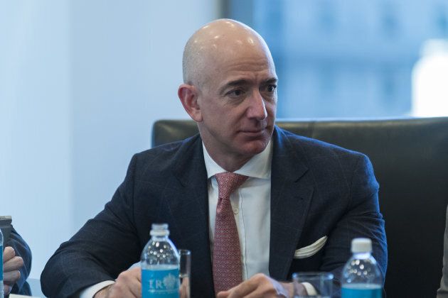 Jeffrey Bezos, president and chief executive officer of Amazon.com Inc., listens during a meeting with U.S. President-elect Donald Trump and technology leaders at Trump Tower in New York, U.S., on Wednesday, Dec. 14, 2016.