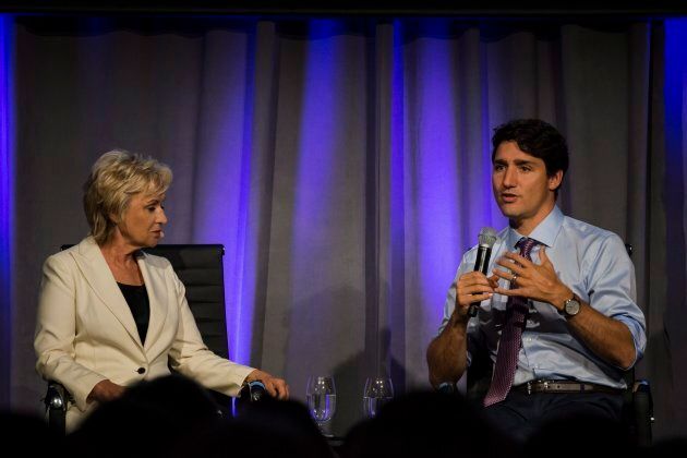 Prime Minister Justin Trudeau speaks with Tina Brown at the Women in the World Summit in Toronto, on Monday, September 11, 2017. THE CANADIAN PRESS/Christopher Katsarov.