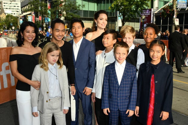 Vivienne Jolie-Pitt, Maddox Jolie-Pitt, Pax Jolie-Pitt, Kimhak Mun, Knox Jolie-Pitt, Shiloh Jolie-Pitt, Angelina Jolie, Zahara Jolie-Pitt and Sareum Srey Moch attend 2017 Toronto International Film Festival - 'First They Killed My Father' Premiere at Princess of Wales Theatre on September 11, 2017 in Toronto, Canada. (Photo by George Pimentel/WireImage)