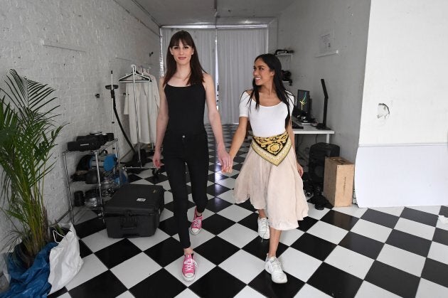 Peche Di, model and founder of transgender model agency (R) practices a runway walk with transgender model Dusty Rose from Alabama on September 5, 2017 in New York City. (ANGELA WEISS/AFP/Getty Images)