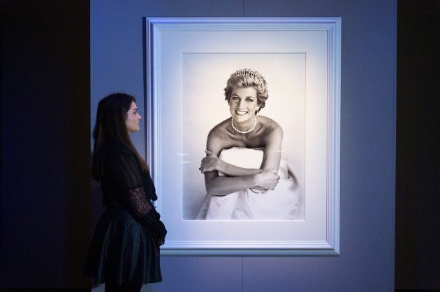 Gallery staff views a photographer of Diana, Princess of Wales for British Vogue, December 1990 by photographer Patrick Demarchelier at the exhibition on November 01, 2016 in London, England. (Photo by Ray Tang/Anadolu Agency/Getty Images)
