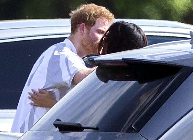 Prince Harry and Meghan Markle embrace following the polo at Cowarth Park Audi Polo Challenge at Coworth, Berkshire, UK - 07 May 2017. (DAVID HARTLEY/REX/Shutterstock)