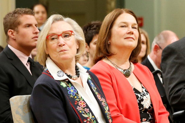 Canada's Minister of Crown-Indigenous Relations and Northern Affairs, Carolyn Bennett, left, and Minister of Indigenous Services Jane Philpott take part in a cabinet shuffle at Rideau Hall in Ottawa on August 28, 2017.