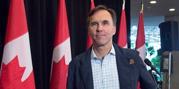 Finance Minister Bill Morneau heads from the podium after talking with reporters as the Liberal cabinet meets in St. John's, N.L. on Tuesday, Sept. 12, 2017.