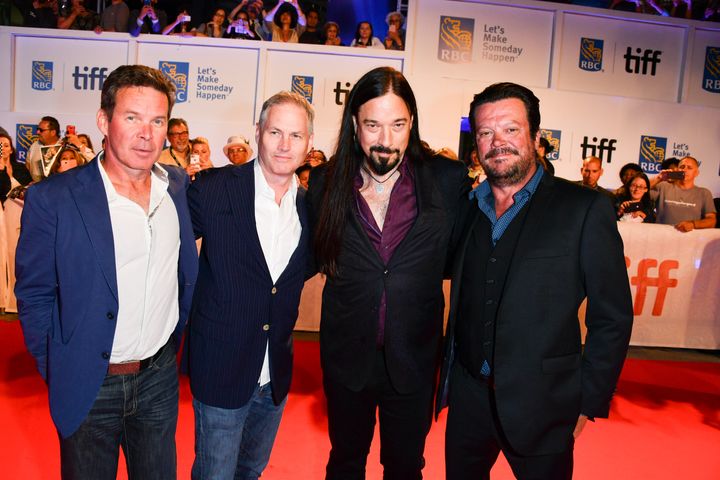 The Tragically Hip (minus Gord Downie), from left: Gord Sinclair, Johnny Fay, Rob Baker and Paul Langlois, on the red carpet for "Long Time Running" during the 2017 Toronto International Film Festival on Wednesday, Sept. 13, 2017.
