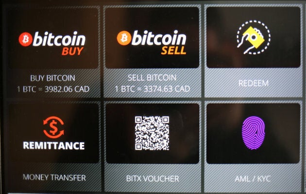 Commands on a Bitcoin ATM are seen at a restaurant in Toronto, Ont., June 3, 2017.