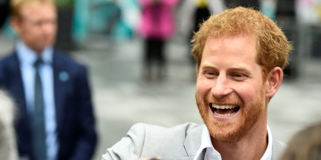 Prince Harry greets people during a visit to St. Anne's Square in Belfast, Northern Ireland, September 7, 2017. (REUTERS/Clodagh Kilcoyne)