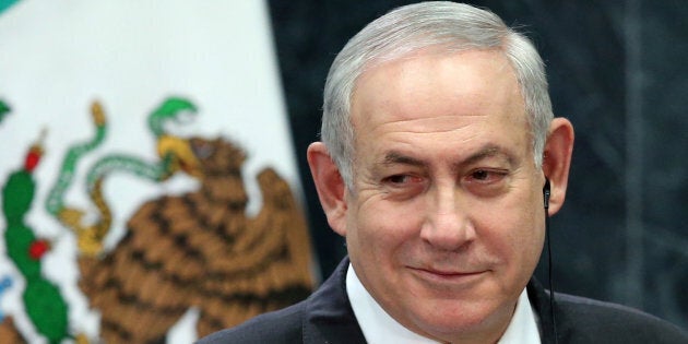 Israeli Prime Minister Benjamin Netanyahu smiles during an address to the media at Los Pinos presidential residence in Mexico City, Mexico, Sept. 14, 2017.