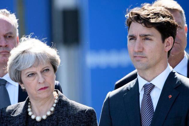 U.K. Prime Minister Theresa May and Canadian Prime Minister Justin Trudeau during the North Atlantic Treaty Organisation (NATO) summit in Brussels.