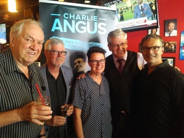 Charlie Angus (second from right) with former NDP leader Ed Broadbent (left), Ottawa city Coun. Catherine McKenney (centre) at a campaign event in Ottawa.