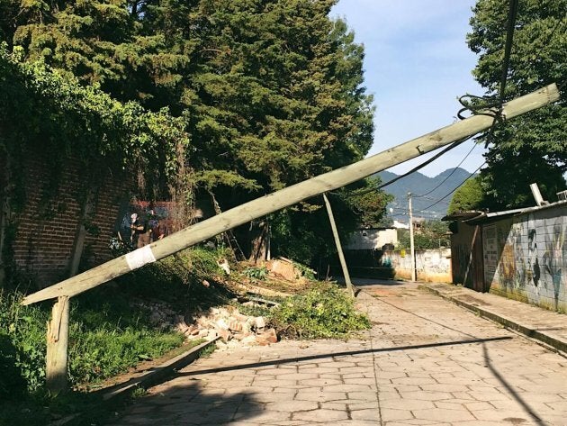 A wall of the Na Bolom Museum had fallen onto the street, taking electric poles with it.