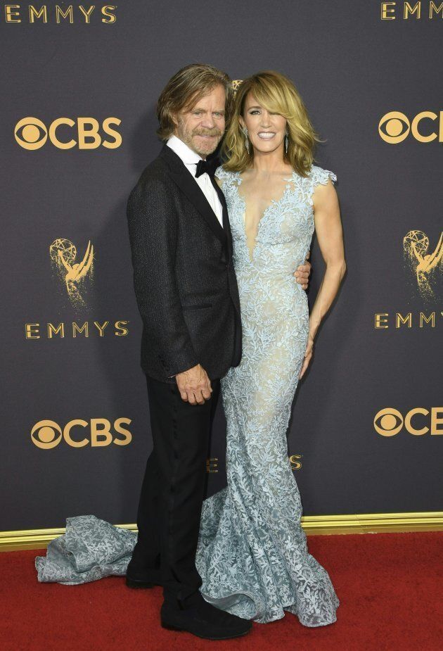 Felicity Huffman and William H. Macy arrive for the 69th Emmy Awards at the Microsoft Theatre on September 17, 2017 in Los Angeles, California. / AFP PHOTO / Mark RALSTON (Photo credit should read MARK RALSTON/AFP/Getty Images)