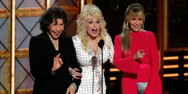 Lily Tomlin, Dolly Parton and Jane Fonda present the award for Outstanding Supporting Actor in a Limited Series or a Movie at the 69th Primetime Emmy Awards, September 17, 2017. (REUTERS/Mario Anzuoni)