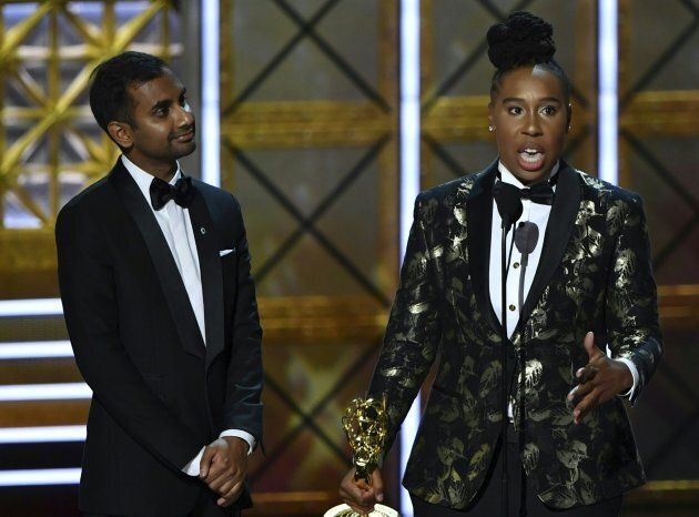 Aziz Ansari and Lena Waithe accept the award for Outstanding Writing for a Comedy Series for 'Master of None' onstage during the 69th Emmy Awards on September 17, 2017 in Los Angeles. (FREDERIC J. BROWN/AFP/Getty Images)