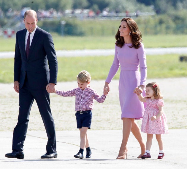 Prince William, Duke of Cambridge, Prince George of Cambridge, Princess Charlotte of Cambridge and Catherine, Duchess of Cambridge view helicopter models on July 21, 2017 in Hamburg, Germany. (Franziska Krug/Getty Images)