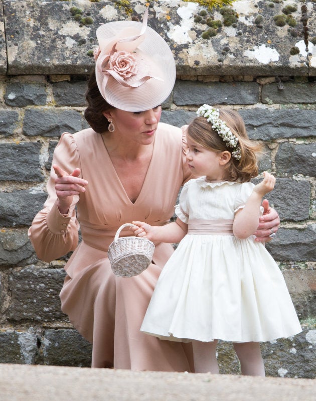 Princess Charlotte of Cambridge and Catherine, Duchess of Cambridge attend the wedding of Pippa Middleton and James Matthews on May 20, 2017 in Englefield Green, England. (Pool/Samir Hussein/WireImage)