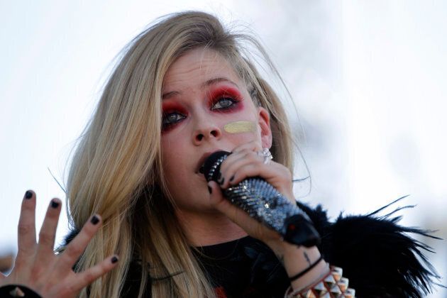 Avril Lavigne performs on the Village stage during the iHeartRadio Music Festival in Las Vegas on Sept. 21, 2013.