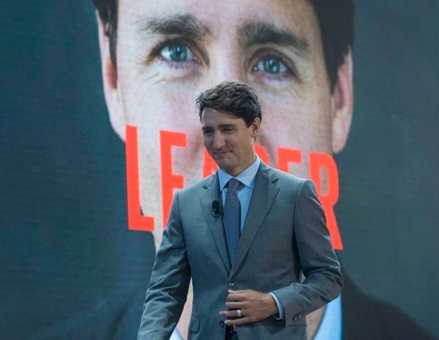 Prime Minister Justin Trudeau makes his way onto the stage for an armchair discussion with Melinda Gates in New York City on Sept. 20, 2017.