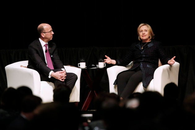 Former U.S. Secretary of State Hillary Rodham Clinton, right, speaks to Victor Dodig, President and CEO of CIBC in Winnipeg on Jan. 21, 2015.