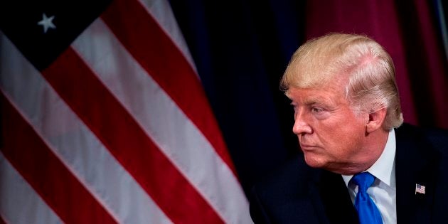 U.S. President Donald Trump waits for a meeting with Qatar's Emir Tamim bin Hamad al-Thani at the Palace Hotel on Sept. 19, 2017 in New York City, on the sidelines of the United Nations General Assembly.