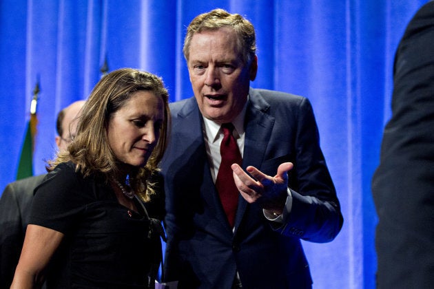 Bob Lighthizer, U.S. trade representative, right, speaks to Chrystia Freeland, Canada's minister of foreign affairs, after opening statements during the first round of North American Free Trade Agreement (NAFTA) renegotiations in Washington, D.C., on August 16, 2017.