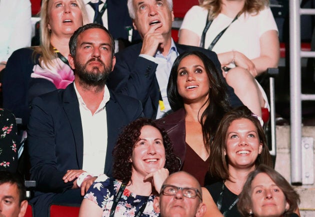 Meghan Markle attends the Invictus Games opening ceremonies Saturday with friend Marcus Anderson (Photo: Mark Blinch/Reuters)