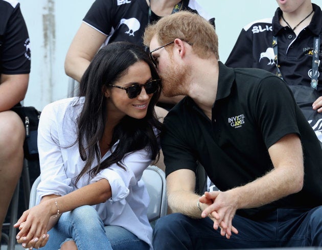 Prince Harry (R) and Meghan Markle (L) attend a Wheelchair Tennis match during the Invictus Games 2017 at Nathan Philips Square on September 25, 2017 in Toronto, Canada (Photo by Chris Jackson/Getty Images for the Invictus Games Foundation )