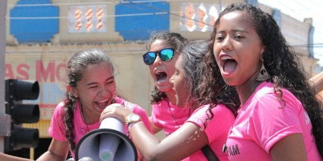 Girls raise their voices during a rally against the rape culture in Brazil.