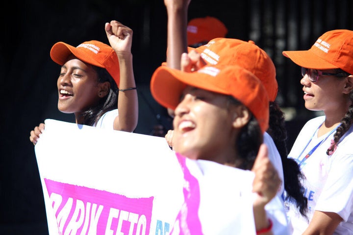 Girls take part in march to mark the International Day of the Girl.