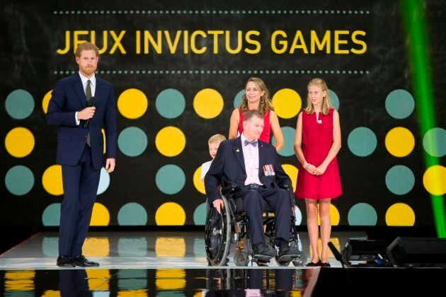 Prince Harry honours Retired Captain Trevor Greene of the Canadian Armed Forces during the opening ceremonies of the Invictus Games in Toronto, Ontario, September 23, 2017. (GEOFF ROBINS/AFP/Getty Images)