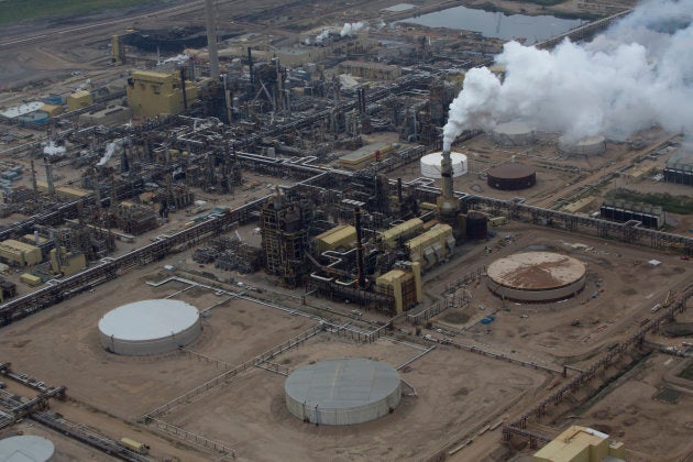 Oil is refined at a Syncrude Canada Ltd. mining site near Fort McMurray, Alta., on Aug. 13, 2013.