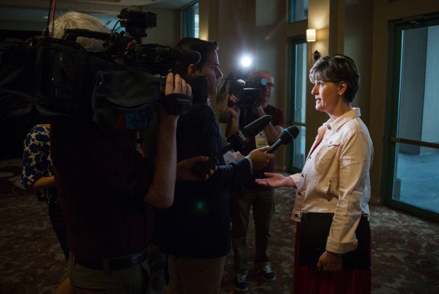 Marie-Claude Bibeau, Canada's minister of international development, speaks to members of the media while arriving at the Federal Liberal Party caucus retreat in Kelowna, British Columbia, on Sept. 7, 2017.