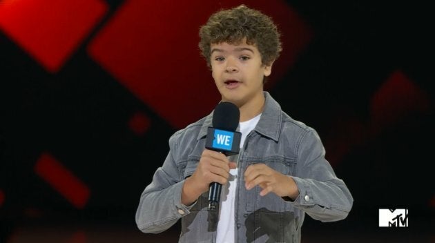 Actor Gaten Matarazzo talks about his rare disorder after removing his mouth piece to show the gaps in his teeth.