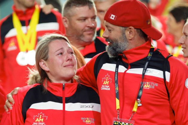 Canadian athletes get emotional as they enter the stage during the Invictus Games closing ceremony.