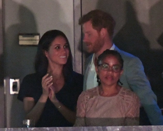 Meghan Markle, Prince Harry and Markle's mom, Doria Radlan watch the Invictus Games closing ceremony.