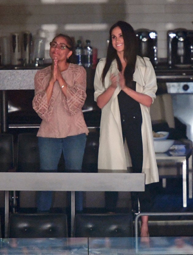 Outfits on point for Doria Radlan and daughter Meghan Markle.