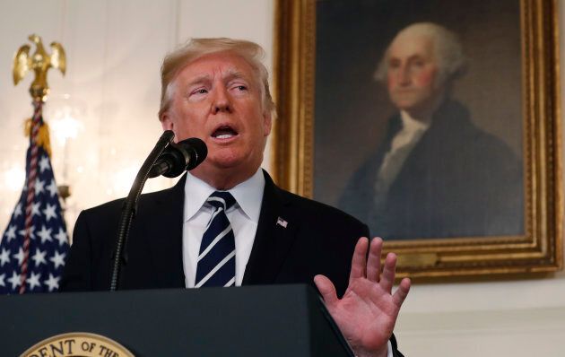 U.S. President Donald Trump makes a statement on the mass shooting in Las Vegas in front of a portrait of President George Washington in the Diplomatic Room at the White House in Washington, D.C. on Monday.