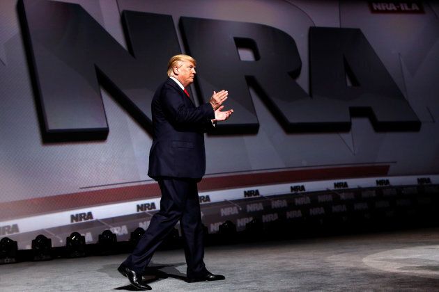 U.S. President Donald Trump arrives onstage to deliver remarks at the National Rifle Association (NRA) Leadership Forum at the Georgia World Congress Center in Atlanta, Ga., on April 28, 2017.