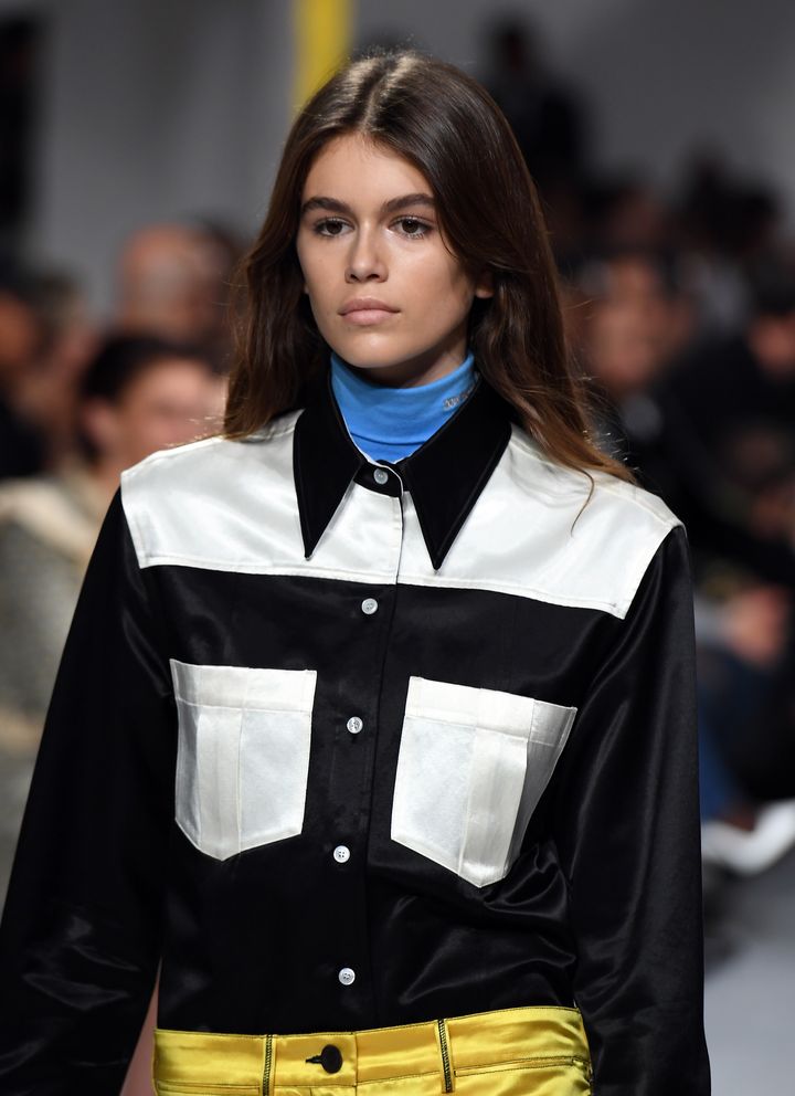 Model Kaia Gerber sports a lustrous beauty look at Calvin Klein Collection.